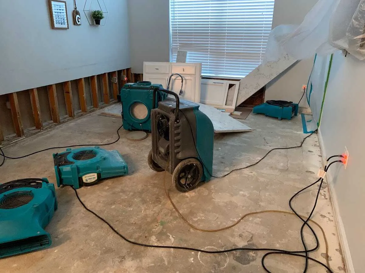 Dehumidifier in flood-cut room for Water Damage Restoration in White Settlement